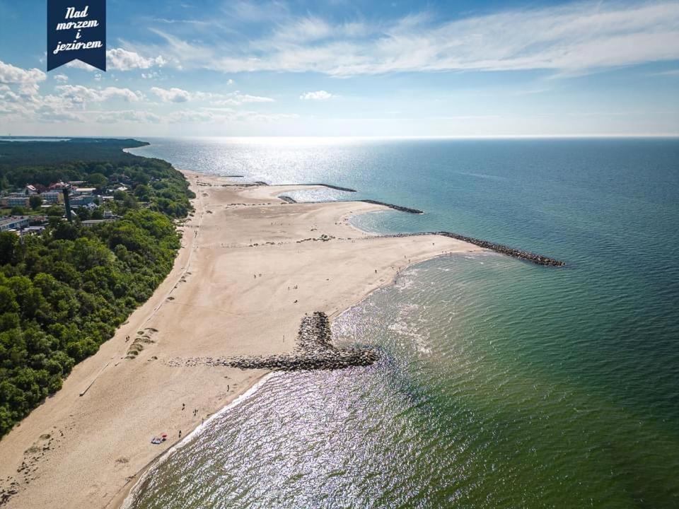 Caloroczne Domki Nad Morzem I Jeziorem Jezierzany Exterior foto